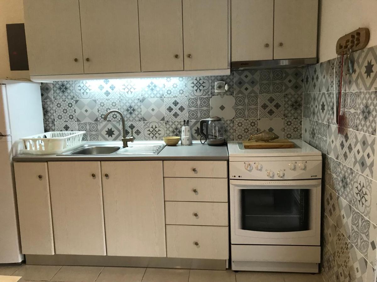 Grey Theros Apartments ปาลาเรีย ดิโอนิซีอู ภายนอก รูปภาพ